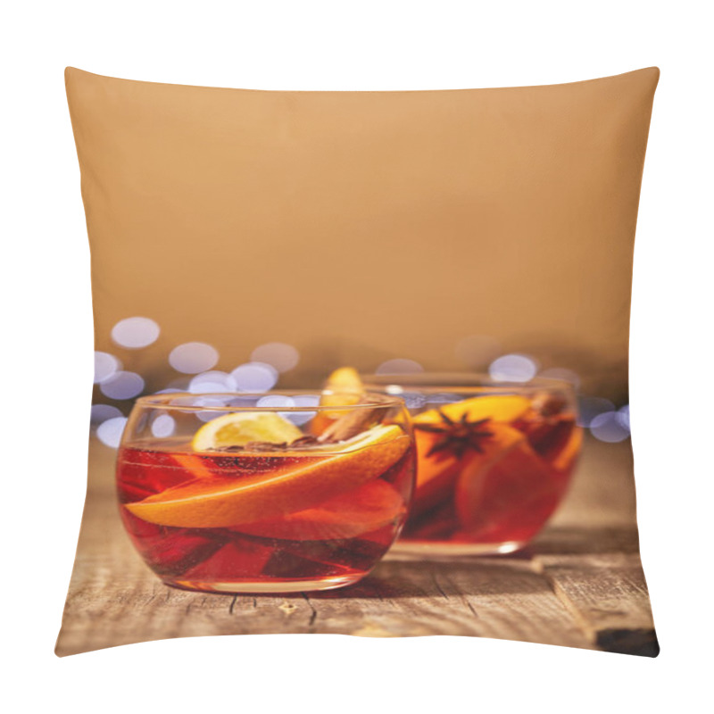 Personality  Close Up View Of Mulled Wine In Glasses With Orange Pieces And Spices On Wooden Surface With Bokeh Lights On Backdrop Pillow Covers