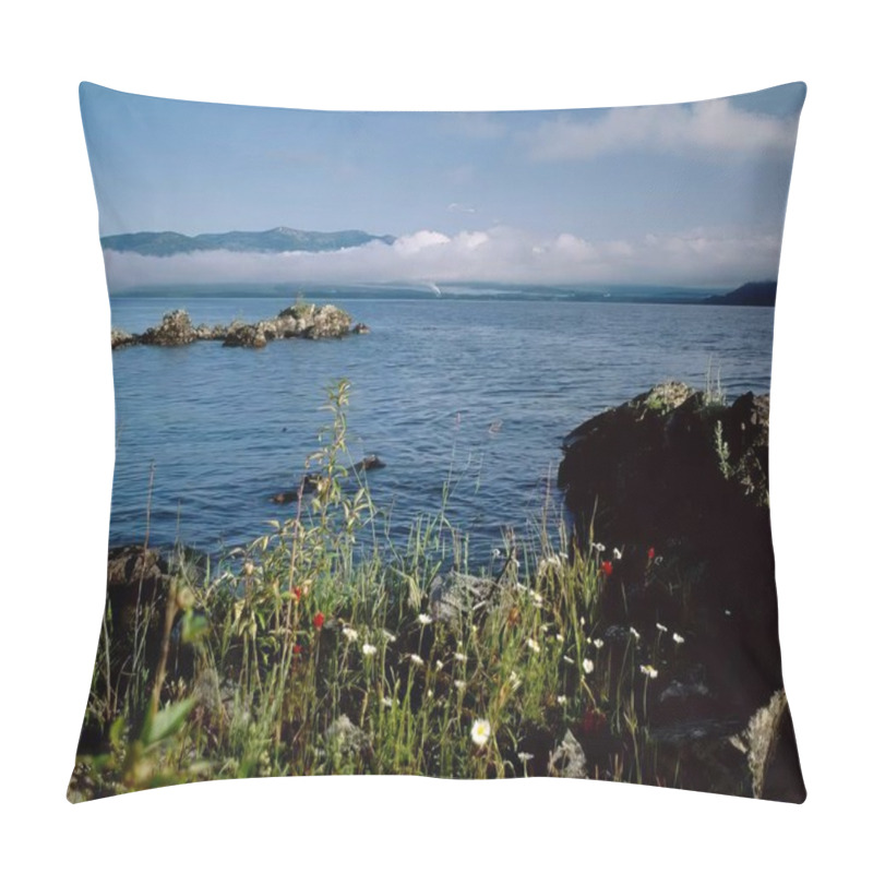 Personality  Serene Azure Waterscape: Vibrant Flowers And Lush Vegetation Under A Cloudy Sky Pillow Covers