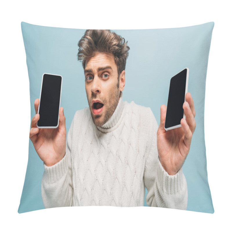 Personality  Stressed Man Showing Two Smartphones With Blank Screens, Isolated On Blue Pillow Covers