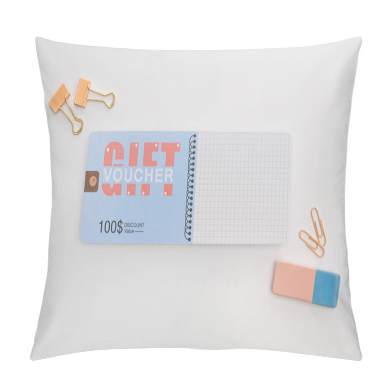 Personality  Top View Of Gift Voucher Near Binder Clips And Eraser On White Surface Pillow Covers