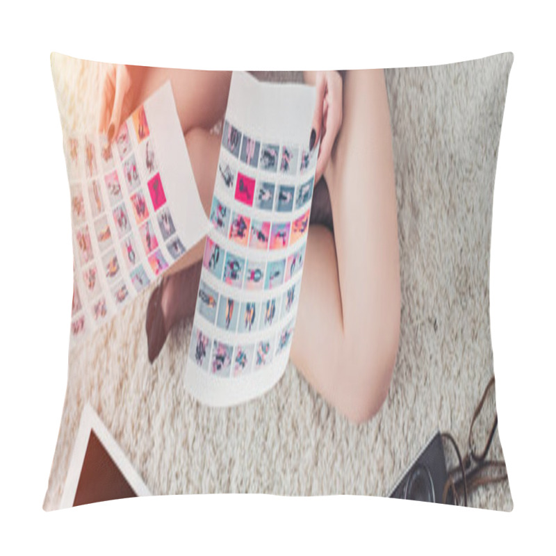 Personality  Cropped View Of Photographer Holding Pictures And Sitting On Carpet Pillow Covers