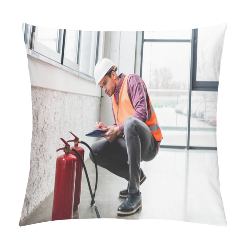 Personality  Handsome Fireman In Helmet Sitting Near Extinguishers And Holding Clipboard Pillow Covers