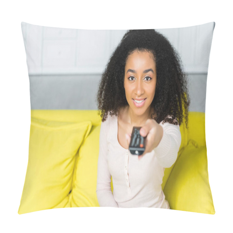 Personality  High Angle View Of Happy African American Woman Holding Remote Controller In Hand Pillow Covers