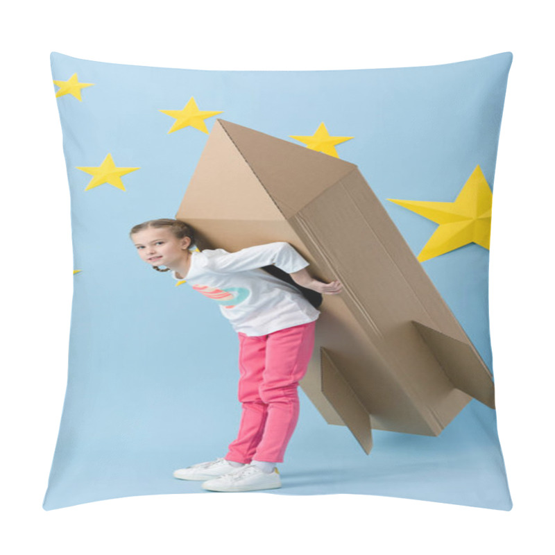 Personality  Carefree Kid In Pink Pants Holding Big Cardboard Rocket On Blue Background With Stars Pillow Covers