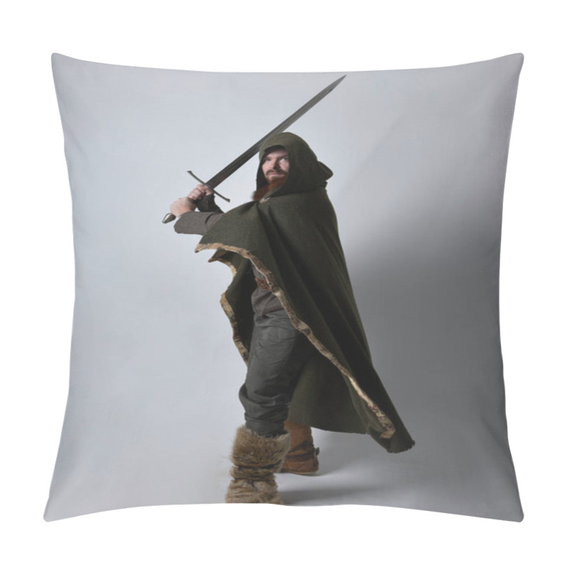 Personality  Full Length  Portrait Of  Young Handsome Man  Wearing  Medieval Celtic Adventurer Costume With Hooded Cloak, Holding Sword, Isolated On Studio Background. Pillow Covers