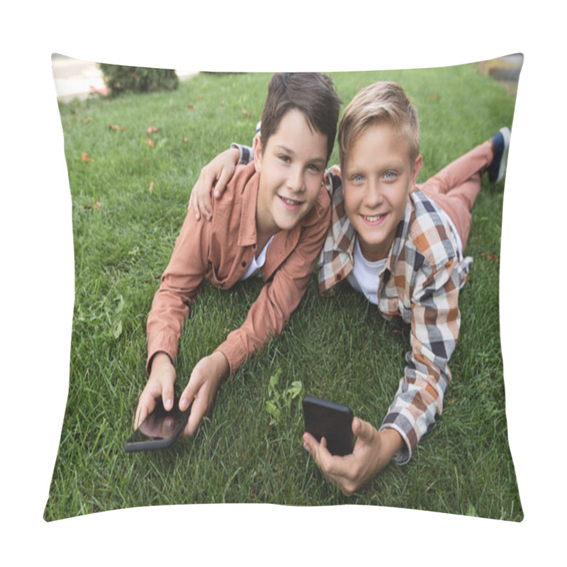 Personality  Two Happy Brothers Lying On Grass, Holding Smartphones And Looking At Camera Pillow Covers