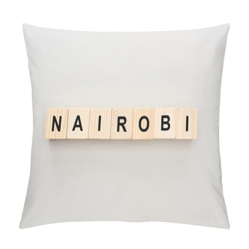 Personality  Top View Of Wooden Blocks With Nairobi Lettering On White Background Pillow Covers