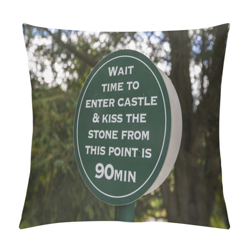 Personality  Blarney, Republic Of Ireland - August 16th 2018: A Sign Informing Visitors That The Wait Time To Kiss The Blarney Stone At The Historic Blarney Castle Is 90 Minutes.  Pillow Covers