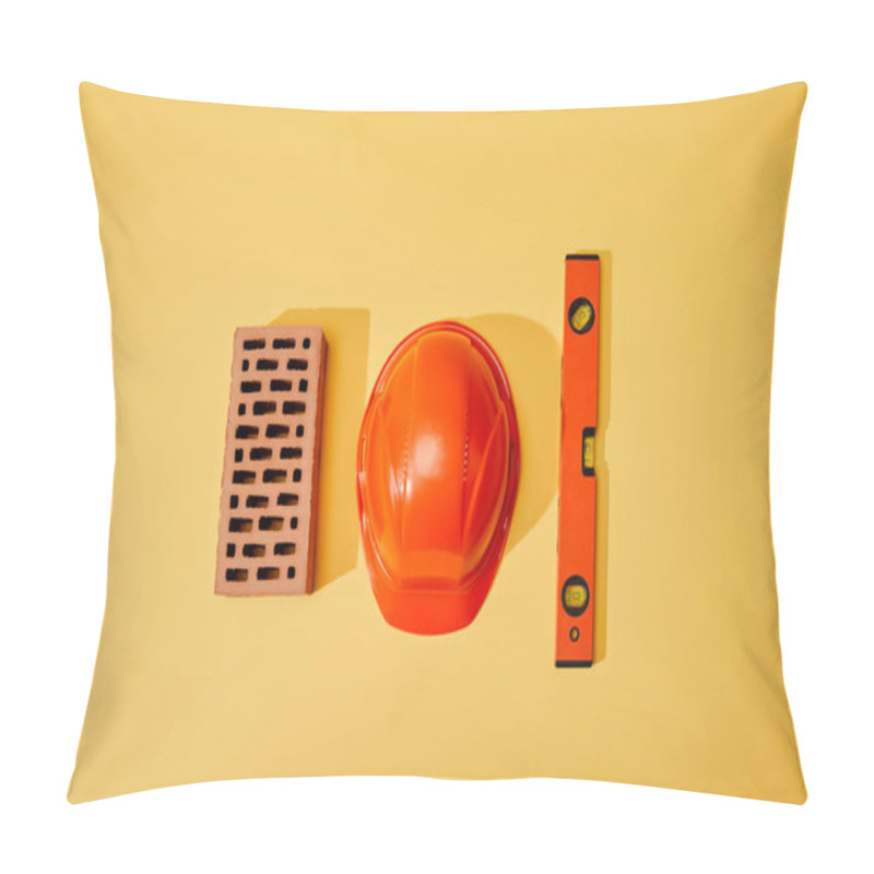 Personality  Top View Of Brick, Orange Helmet And Spirit Level On Yellow Background Pillow Covers