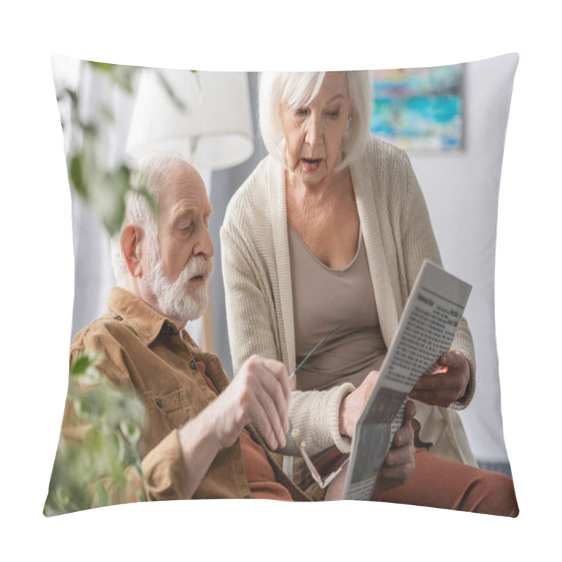 Personality  Selective Focus Of Attentive Senior Couple Reading Newspaper Together Pillow Covers