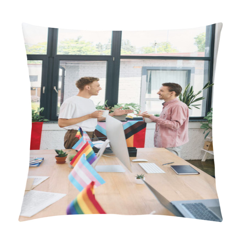 Personality  Two Smiling Individuals Enjoy A Heartfelt Conversation Adorned With Pride Flags In A Sunny Office. Pillow Covers