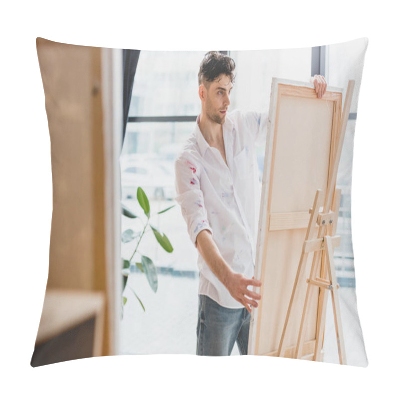 Personality  Selective Focus Of Handsome Artist Fixing Canvas On Easel In Gallery Pillow Covers