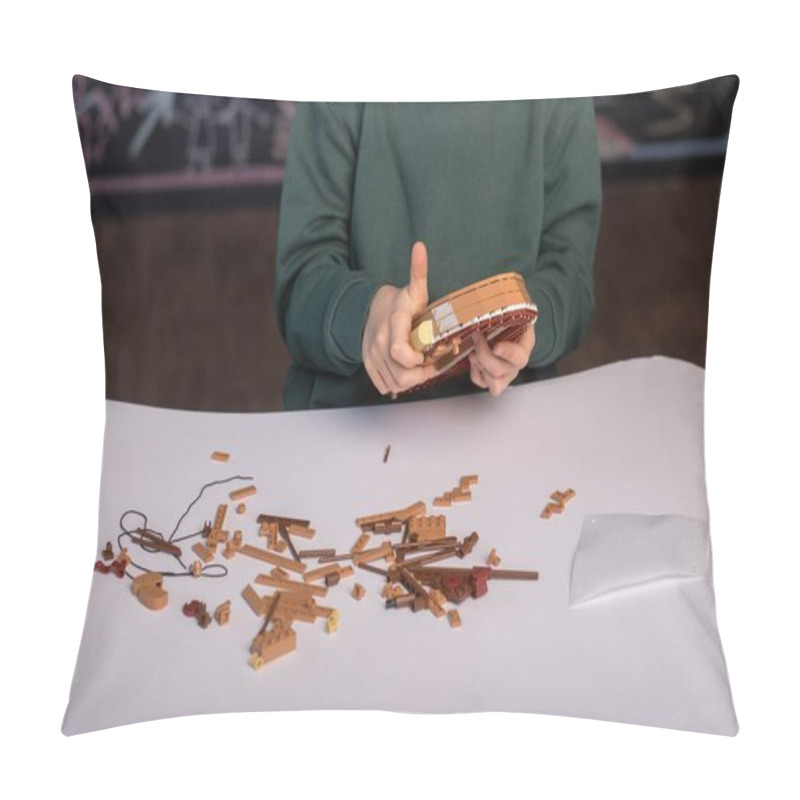 Personality  Person Assembling A Wooden Model On A White Table, Surrounded By Small Parts. The Detailed Work Emphasizes Creativity, Precision, And Craftsmanship In Model Building. Pillow Covers