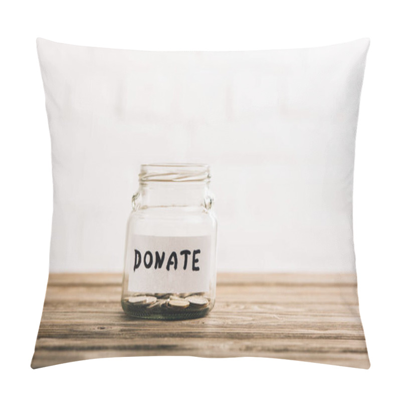 Personality  Penny Jar With Donate Lettering On Wooden Surface On White Background Pillow Covers