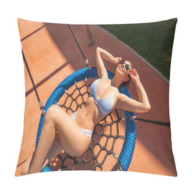 Personality  A Dark-haired, Thin Woman In A Blue Bathing Suit And Round Glasses Sunbathes, Smiles, Enjoys The Sun And Swings On A Large Swing On A Warm Summer Day Pillow Covers