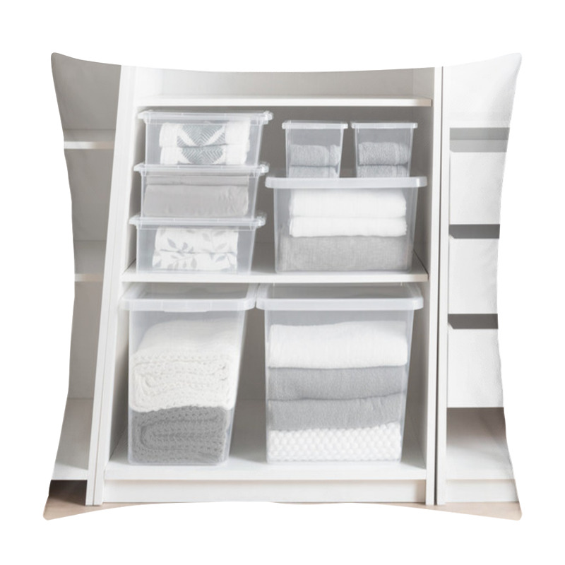 Personality  Contemporary White Closet Interior With Transparent Plastic Sweater Storage Boxes Organizing Folded Towels And Soft Blankets, Complementing The Clean, Organized Bedroom Ambiance, Minimalist Design. Pillow Covers