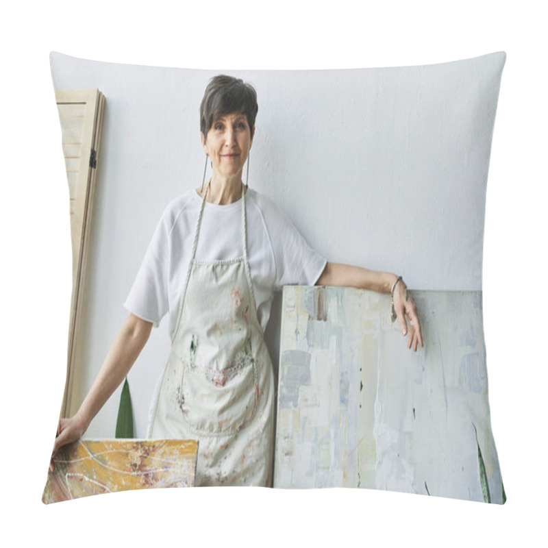 Personality  A Woman In An Apron Stands Proudly By Her Canvases In A Sunlit Art Studio. Pillow Covers