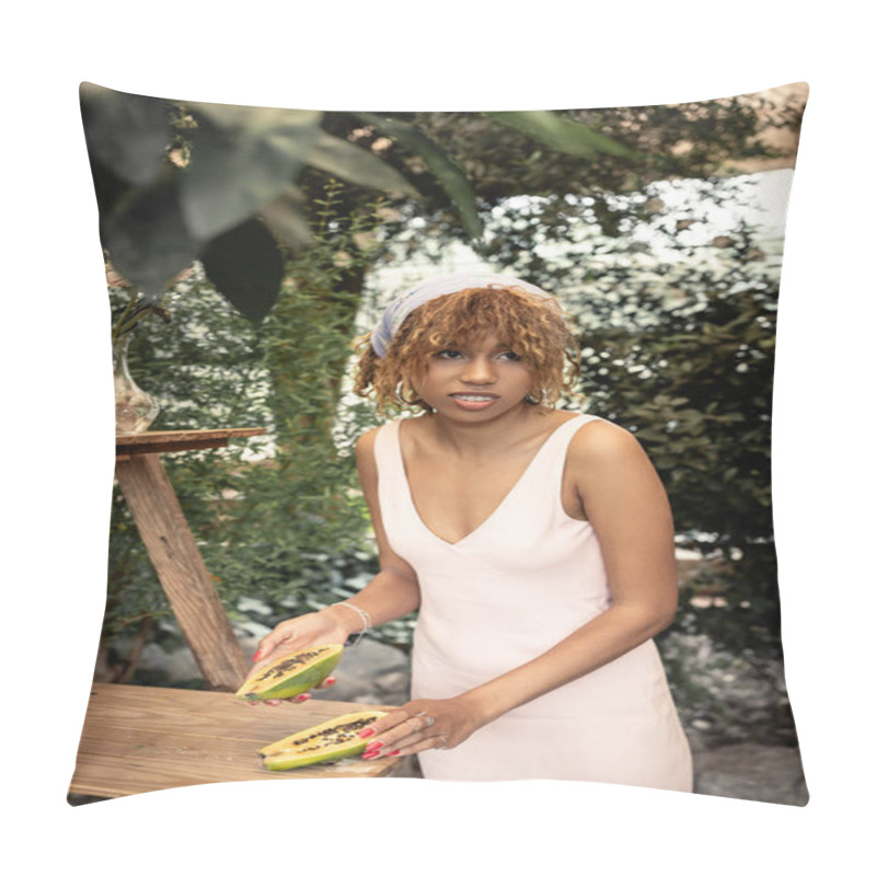 Personality  Smiling Young African American Woman In Headscarf And Summer Dress Holding Cut And Ripe Papaya While Standing Near Green Plants In Greenery,  Lady Inspired By Tropical Plants, Summer Concept Pillow Covers