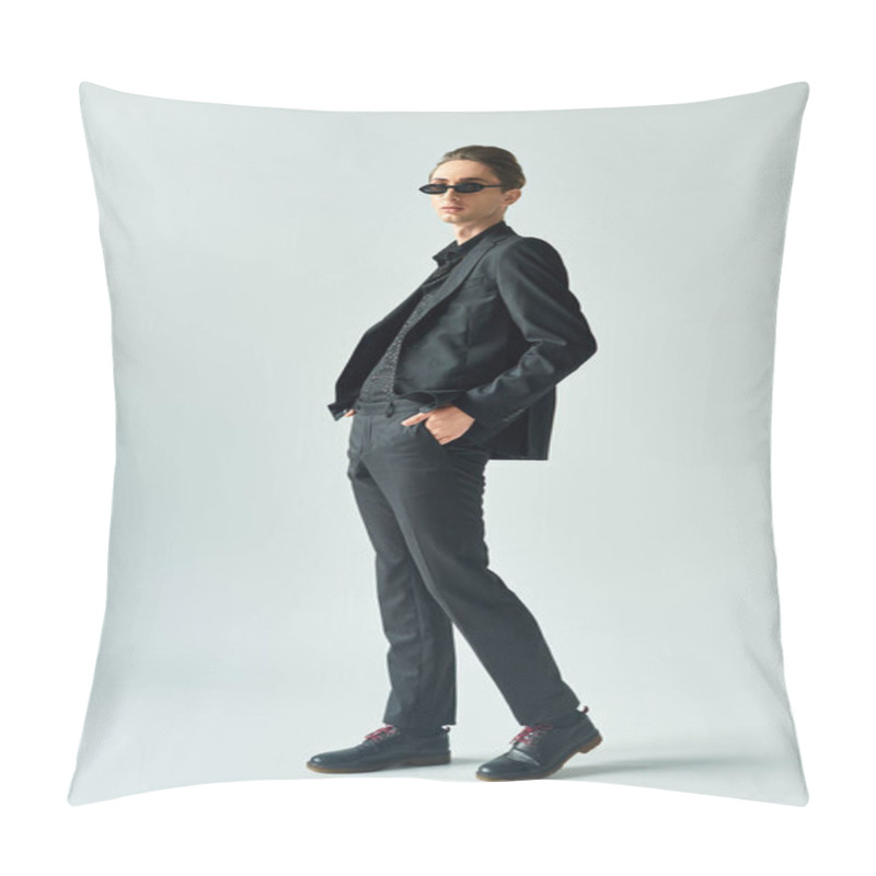 Personality  A Young Queer Person Exudes Confidence In A Black Suit And Sunglasses, Striking A Pose In A Stylish Studio Setting. Pillow Covers