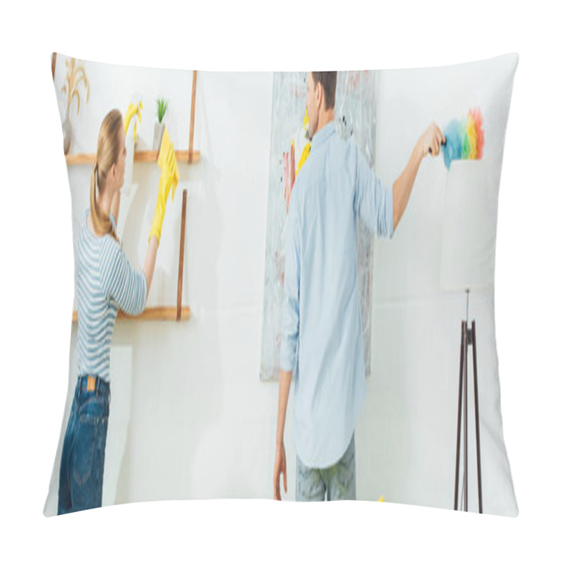 Personality  Back View Of Young Couple Cleaning With Dust Brush And Spray Detergent In Living Room, Panoramic Shot Pillow Covers