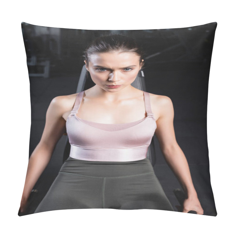 Personality  Tense Sportswoman In Top And Leggings Training On Exercising Machine In Gym Pillow Covers