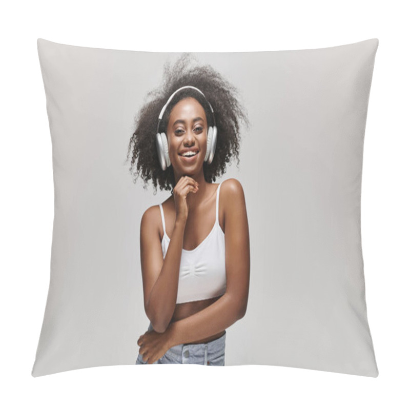 Personality  A Young African American Woman With Curly Hair Stands In Front Of A White Background, Wearing Headphones. Pillow Covers