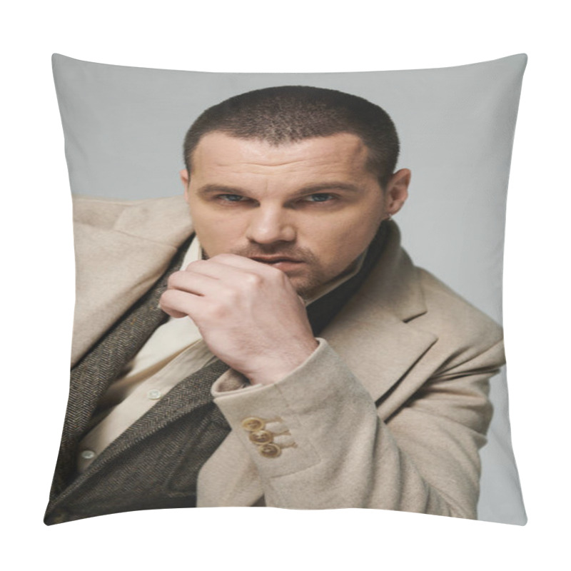 Personality  A Stylish Man In A Beige Coat, With A Thoughtful Expression, Gazes Off Into The Distance. Pillow Covers