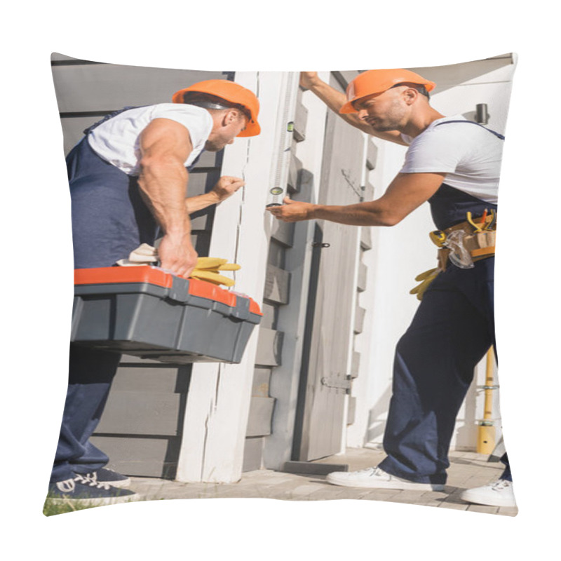 Personality  Selective Focus Of Workmen With Tools And Spirit Level Working With Facade Of Building  Pillow Covers