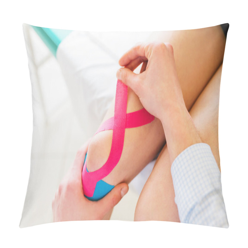 Personality  Therapist Applying Tape To Patient Knee Pillow Covers