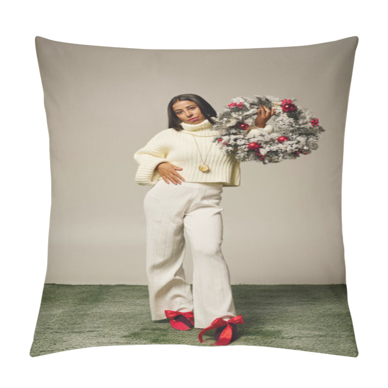 Personality  A Young, Beautiful Woman Showcases A Festive Wreath While Dressed In A Chic Winter Outfit. Pillow Covers