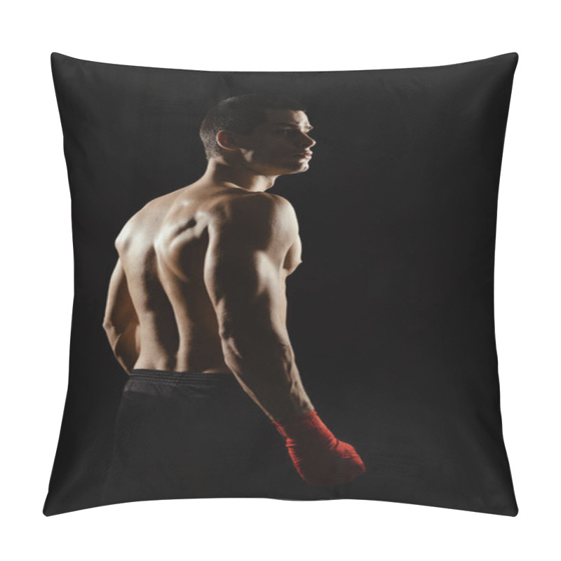 Personality  Portrait Of Male Boxer Posing In Boxing Stance, Looking Over Shoulder, Against Black Background. Pillow Covers