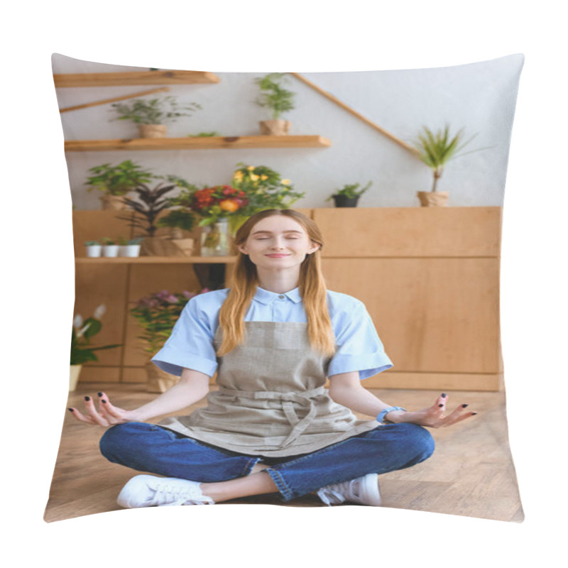 Personality  Smiling Young Florist In Apron Sitting In Lotus Position On Floor In Flower Shop Pillow Covers