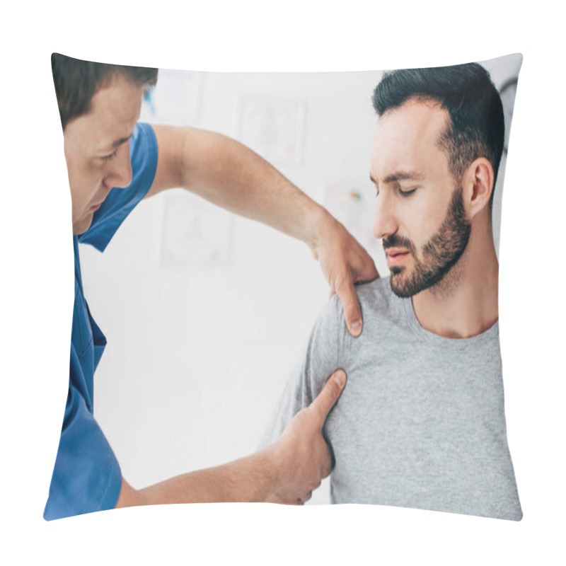 Personality  Selective Focus Of Patient Sitting On Couch And Doctor Massaging Patient Shoulder In Massage Cabinet At Clinic Pillow Covers