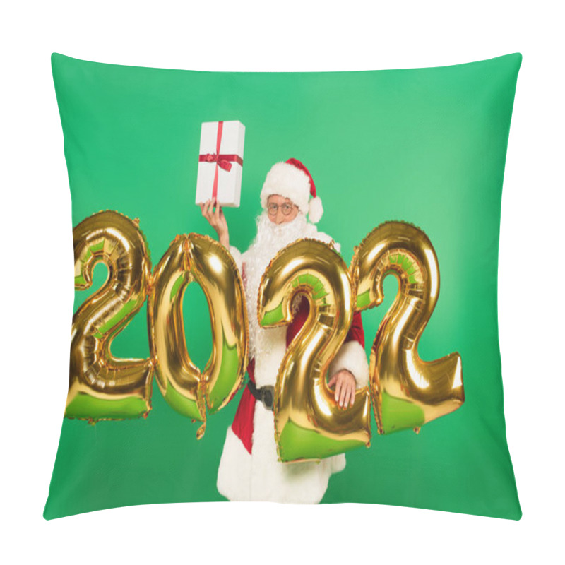 Personality  Santa Claus Holding Gift Near Balloons In Shape Of 2022 Numbers Isolated On Green Pillow Covers