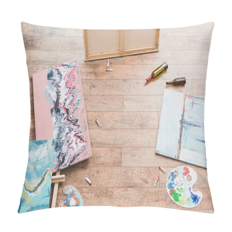 Personality  High Angle View Of Paintings, Draw Utensils And Empty Bottles On Wooden Floor In Painting Studio Pillow Covers