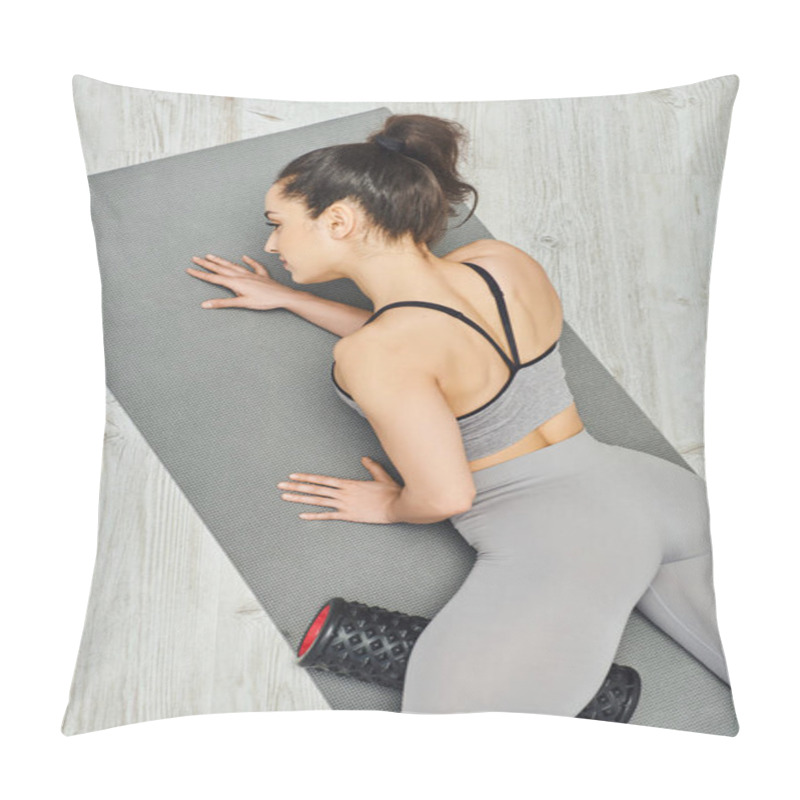 Personality  Top View Of Young Brunette Woman In Sportswear Massaging Leg With Roller Massager And Lying On Fitness Mat At Home, Maintaining Healthy Lymphatic System Concept, Tension Relief Pillow Covers