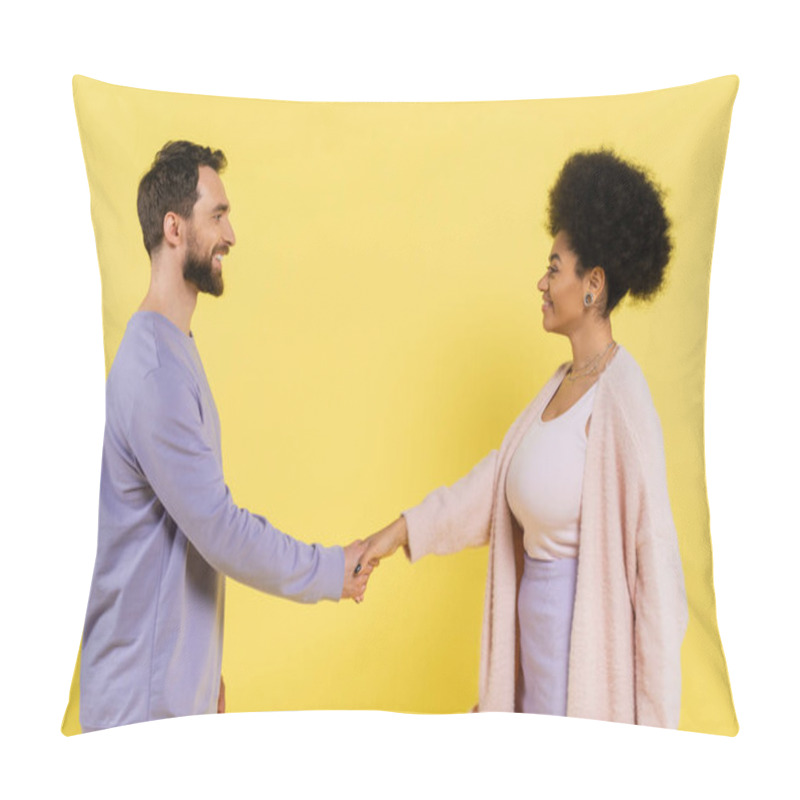 Personality  Side View Of Bearded Man And Curly African American Woman Shaking Hands And Smiling At Each Other Isolated On Yellow Pillow Covers