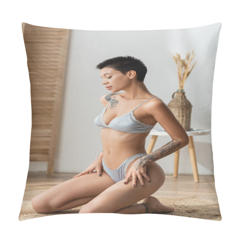 Personality  Full Length Of Stunning Tattooed Woman With Sexy Body And Short Brunette Hair Sitting On Wicker Rug In Lingerie Near Blurred Room Divider And Vase With Spikelets On Bedside Table In Bedroom Pillow Covers