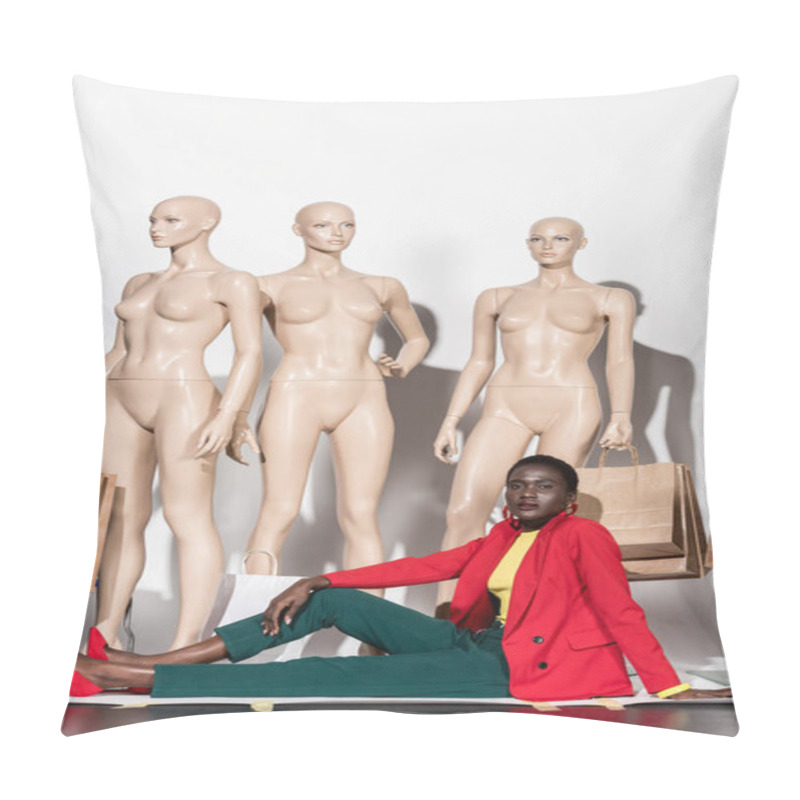 Personality  Fashionable African American Woman Looking At Camera While Sitting In Front Of Mannequins With Shopping Bags   Pillow Covers