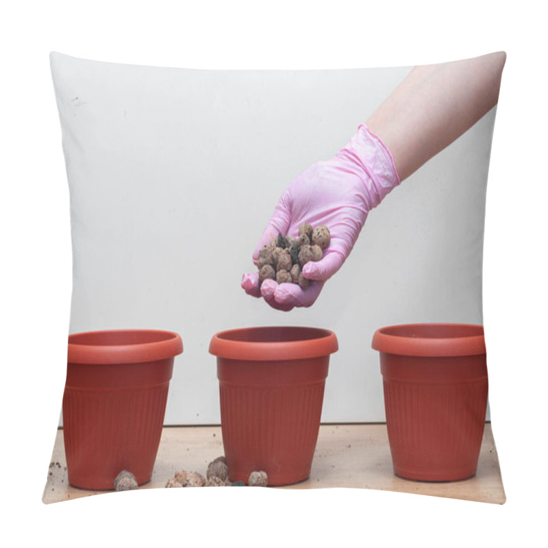 Personality  Gloved Hand Layers Expanded Clay Aggregate Drainage In Small Pots For Transplanting Houseplants Pillow Covers