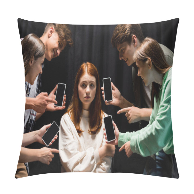 Personality  Smiling Teenagers Pointing With Fingers At Girl During Bullying And Holding Smartphones With Blank Screen On Black Pillow Covers