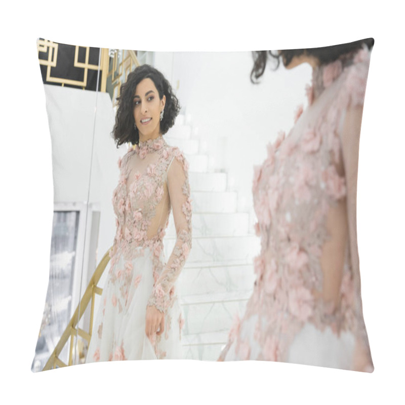 Personality  Brunette Middle Eastern Woman With Wavy Hair Standing In Gorgeous And Floral Wedding Dress While Looking At Mirror In Luxurious Bridal Salon, Happy Bride, Charming And Elegant, Reflection, Shopping Pillow Covers