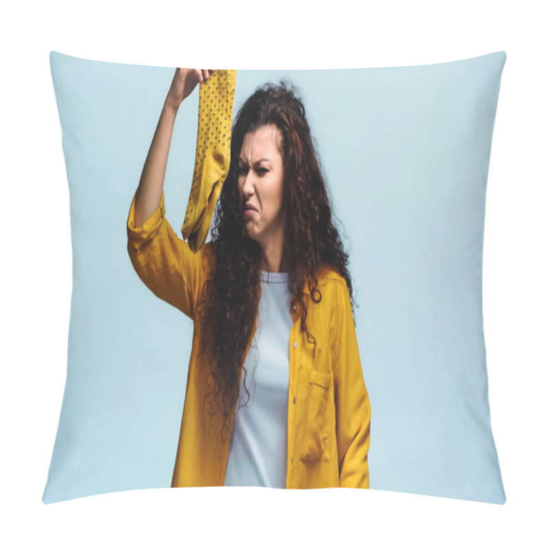 Personality  Frowning Woman Holding Stinking Socks Isolated On Blue Pillow Covers