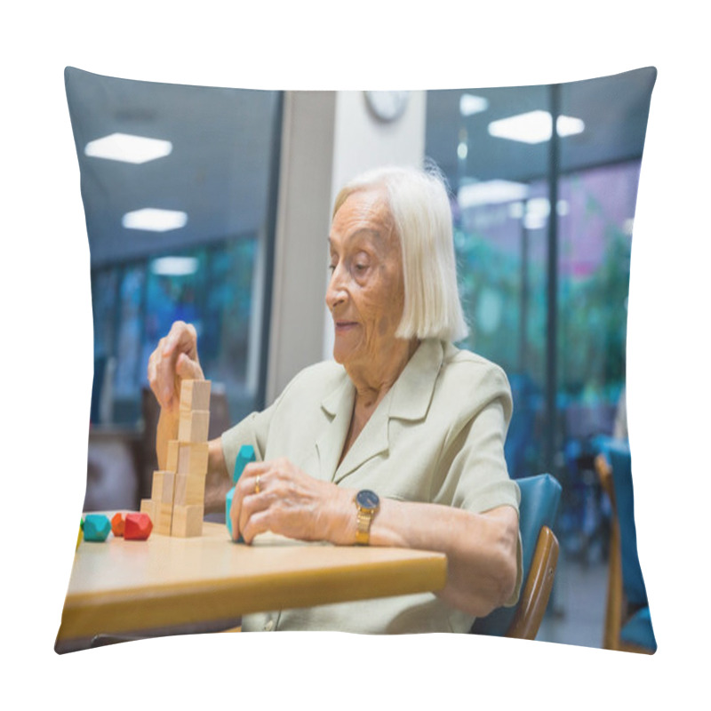 Personality  Portrait Of A Cheerful Cute Elder Woman In A Nursing Home Playing Skill Games Pillow Covers