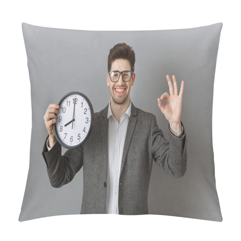 Personality  Portrait Of Smiling Businessman With Clock In Hand Showing Ok Sign On Grey Wall Background Pillow Covers