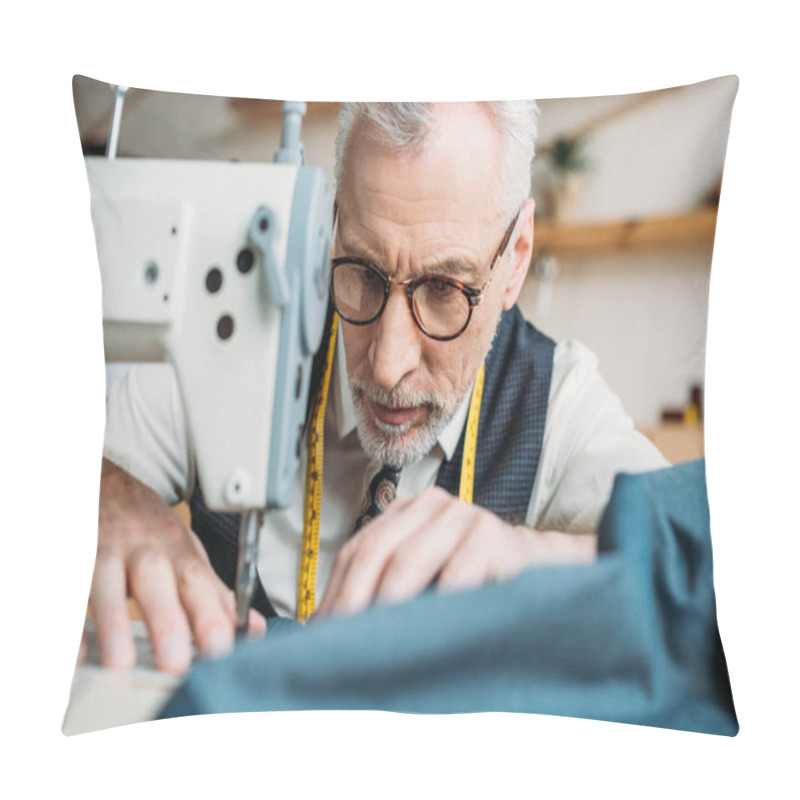 Personality  Serious Handsome Tailor Sewing Cloth With Sewing Machine At Sewing Workshop Pillow Covers