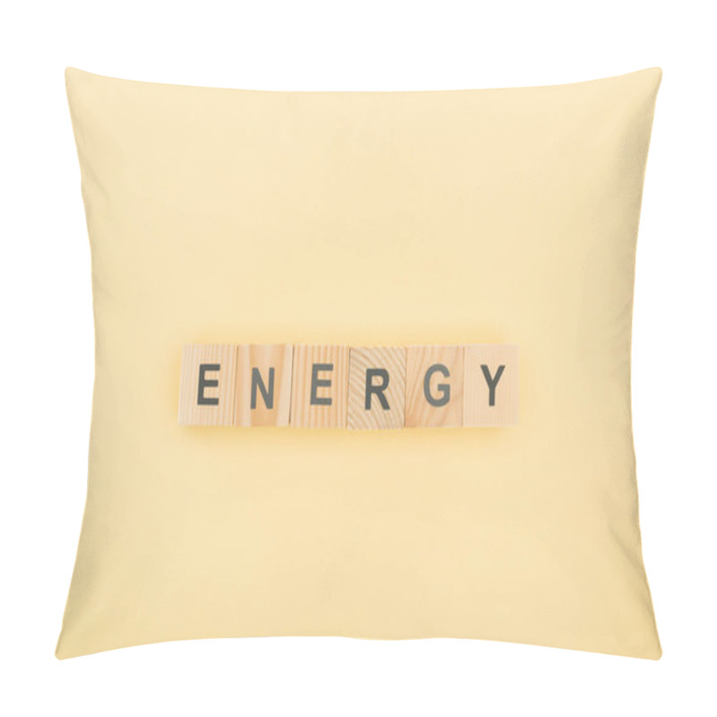 Personality  Top View Of Energy Lettering Made Of Wooden Cubes On Yellow Background Pillow Covers