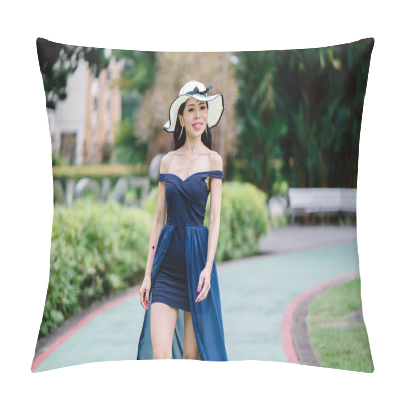 Personality  Portrait Of Asian Chinese Woman In An Elegant  Blue Dress Posing With A White Broad-brimmed Hat During The Day In A Park In Asia. Pillow Covers