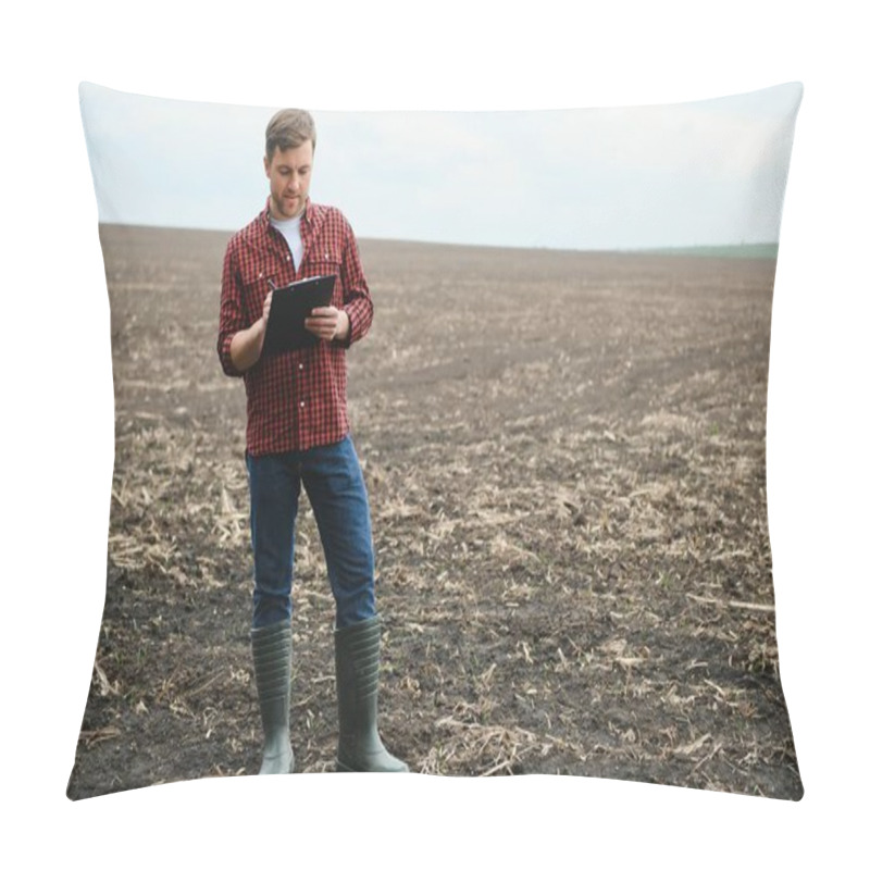 Personality  A Farmer In Boots Works With His Tablet In A Field Sown In Spring. An Agronomist Walks The Earth, Assessing A Plowed Field In Autumn. Agriculture. Smart Farming Technologies. Pillow Covers