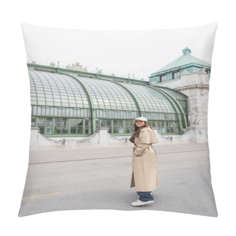 Personality  Happy Young Woman In Stylish Trench Coat And Baseball Cap Standing On Rooftop Of European Building  Pillow Covers